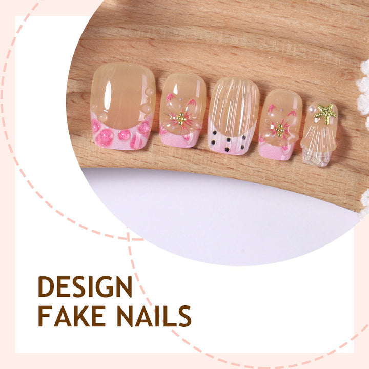 Artificial nail set with floral accents and glamorous decorations Kalsten