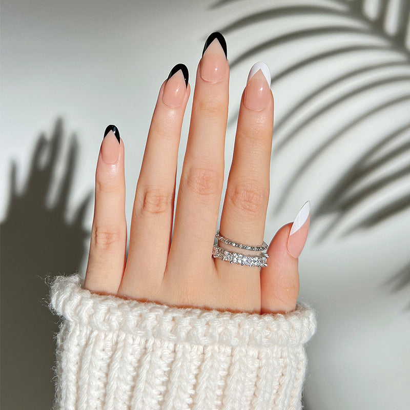 Artificial stiletto nails with elegant design and glamour embellishments Kalsten