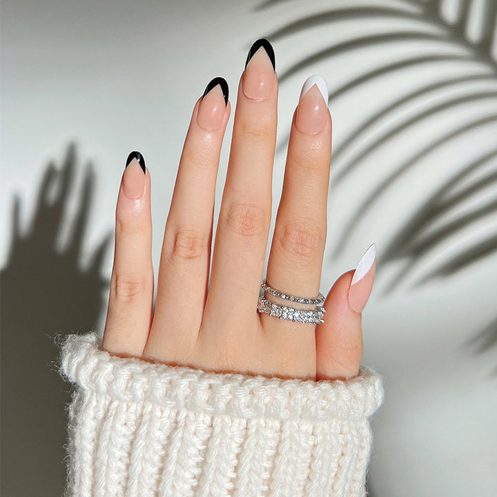 Artificial stiletto nails with elegant design and glamour embellishments Kalsten