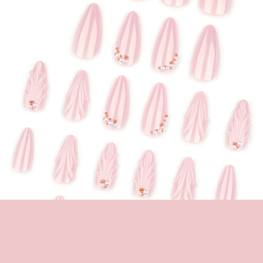 Elegant stiletto nails with shimmer design and pearl decorations Kalsten