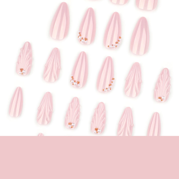 Elegant stiletto nails with shimmer design and pearl decorations Kalsten