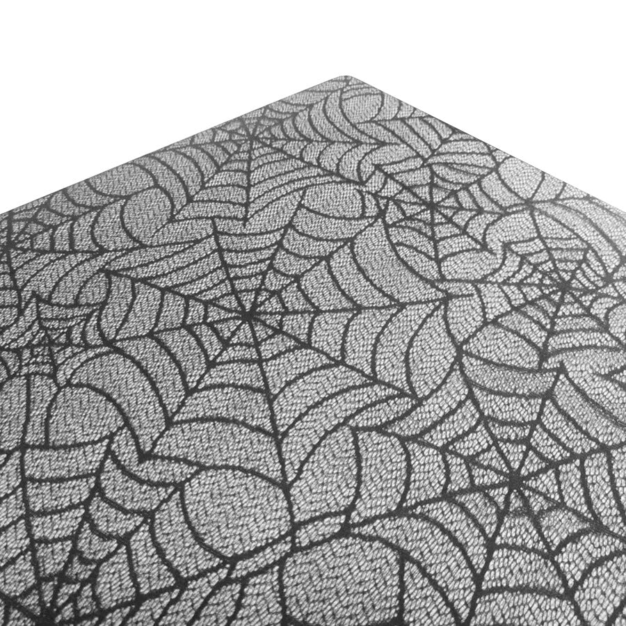 Transparent lace table cover with spider web design for Halloween decor