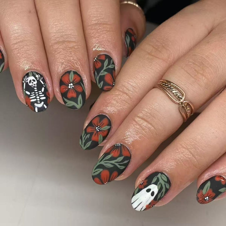 Acrylic nail set with creepy Halloween designs and floral accents Kalsten