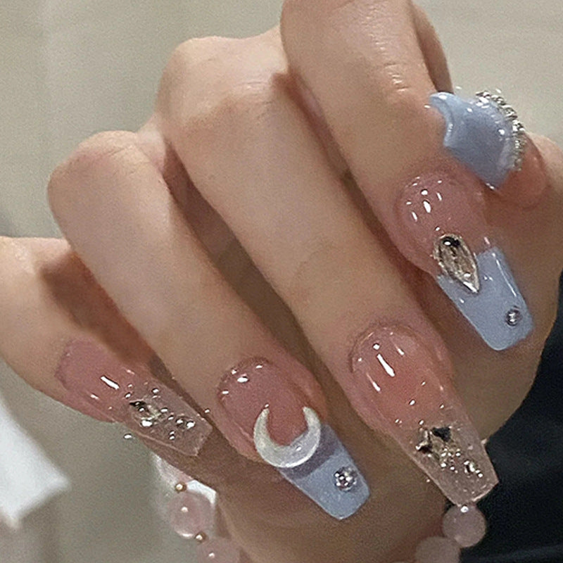 Glamorous artificial fingernails with glitter and moon designs Kalsten