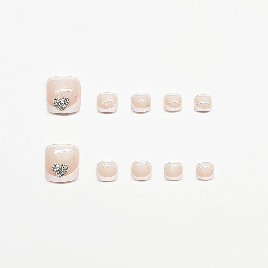 Artifical nail set with glamorous heart design and elegant French tip Kalsten