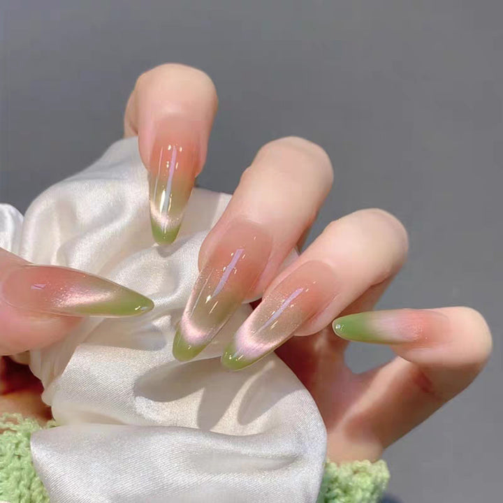 Artistic Press-On Nail Design with Decorative Silver Accents Kalsten