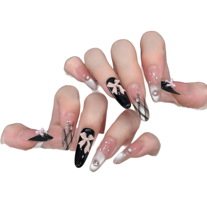 Artificial nail tips with elegant bows and glitter details Kalsten