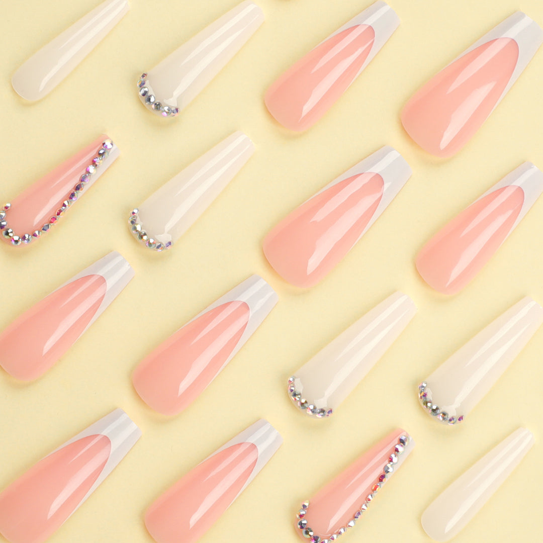 Artful nail extensions with rhinestone embellished accents Kalsten