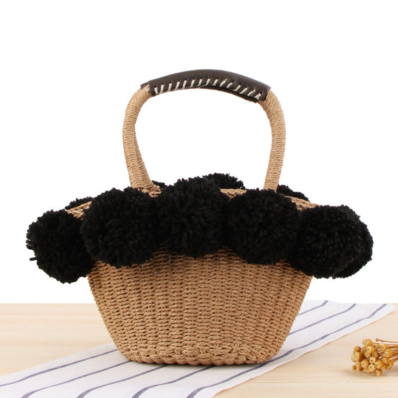 Basket bag with pompom decorated top edge Kalsten