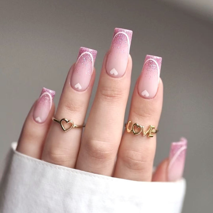 Nail art set with romantic heart designs and glamorous accents Kalsten