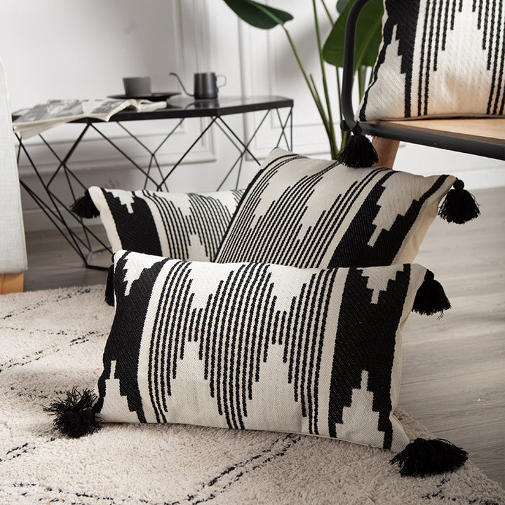 Rectangular Jacquard lumbar cushion cover with geometric ethnic relief and decorative tassels Kalsten