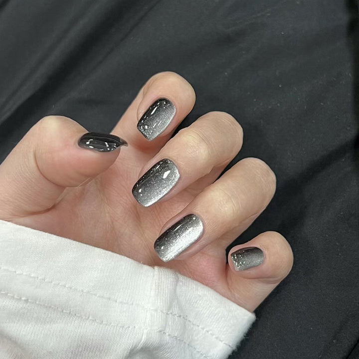 Artifical nail set with glamorous ombre effect and glitter embellishments Kalsten