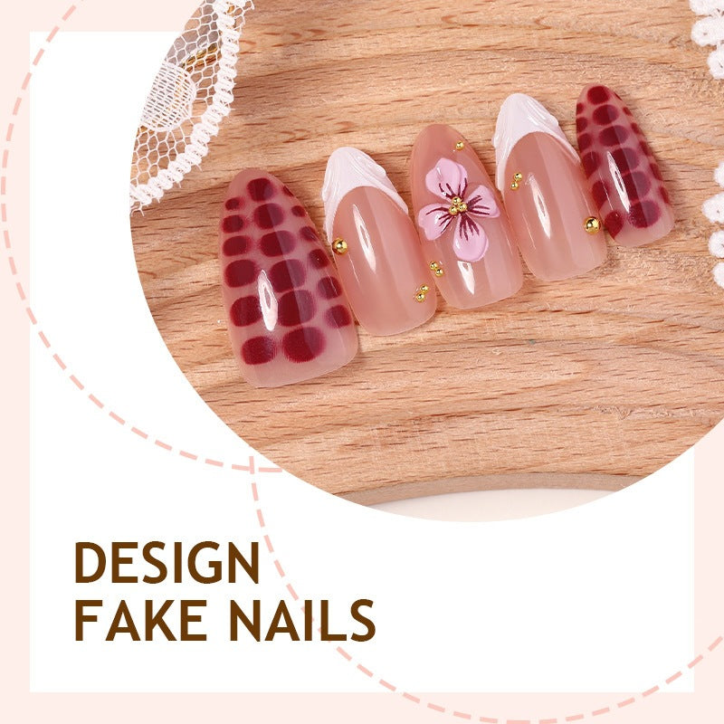 Artificial nail set with exciting flower and glitter designs Kalsten