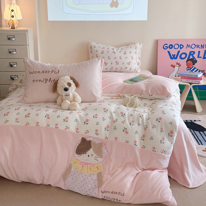 Quilted bedding and throw blanket set with check stitching, velvet texture, and floral appliqué