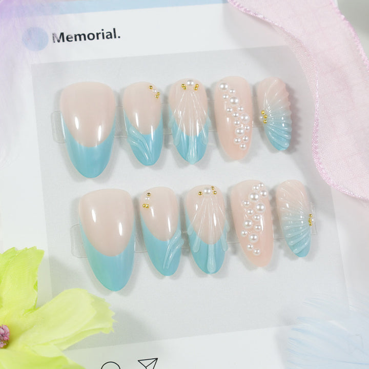 Art nail set with elegant shell and pearl decorations Kalsten