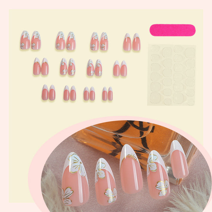Artificial nail set with elegant flower and French tip design Kalsten