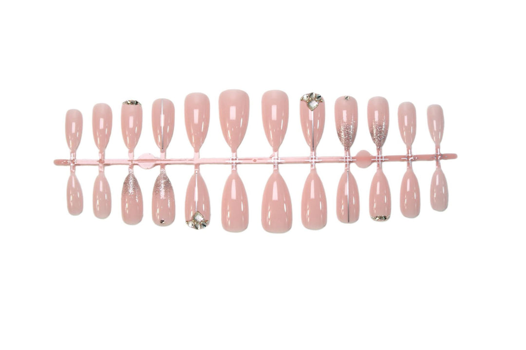 Glamorous artificial nails with rhinestone accents and shimmering effects Kalsten