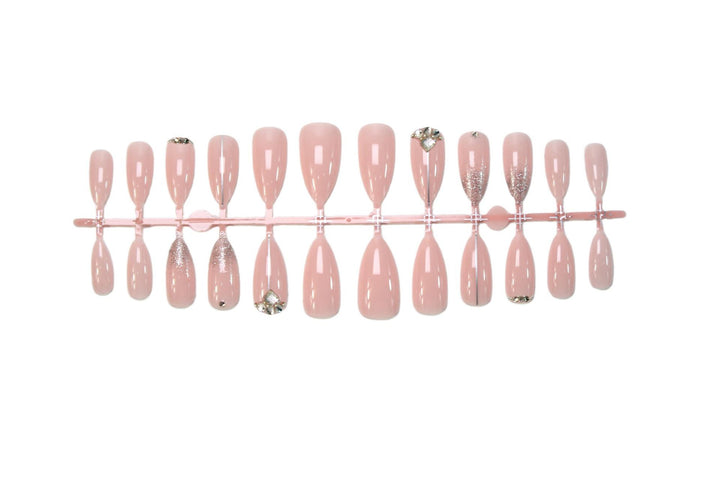 Glamorous artificial nails with rhinestone accents and shimmering effects Kalsten