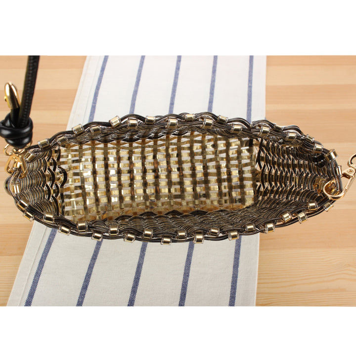 Shoulder bag made of handwoven synthetic material with fashionable sliding mechanism Kalsten