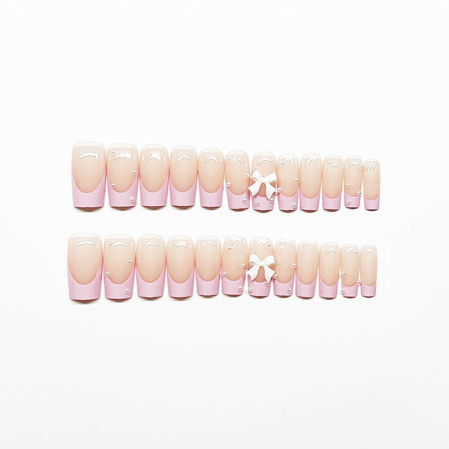 Artificial nail set with romantic bow and pearl embellishments Kalsten