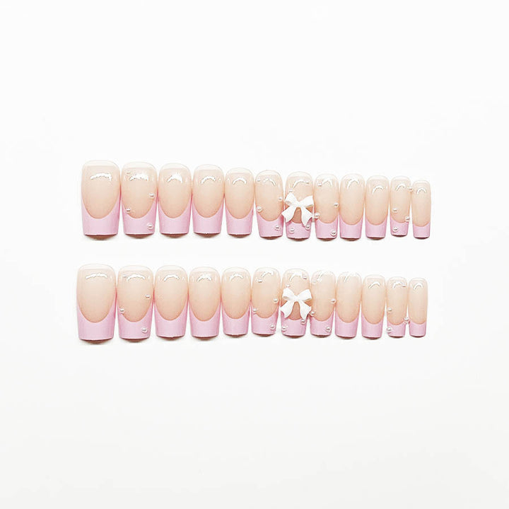 Artificial nail set with romantic bow and pearl embellishments Kalsten