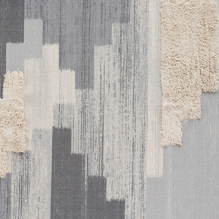 Modern woven living room rug with abstract structure and tufted high-pile accents Kalsten