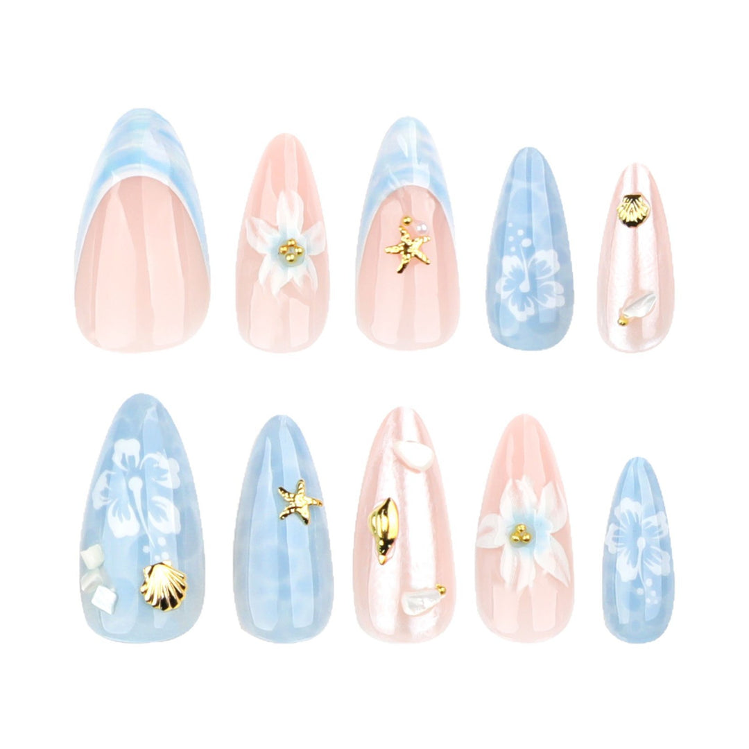 Artful nail extensions with delicate floral designs and glitter accents Kalsten