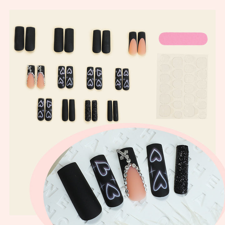 Artificial nail set with elegant glitter and heart designs Kalsten