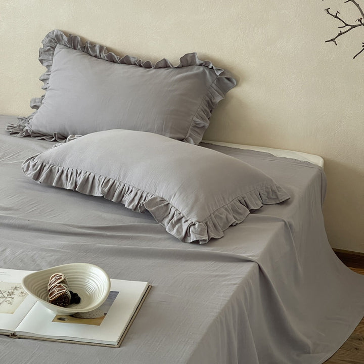 Romantic ruffled bedding set with pillowcases and fitted sheets