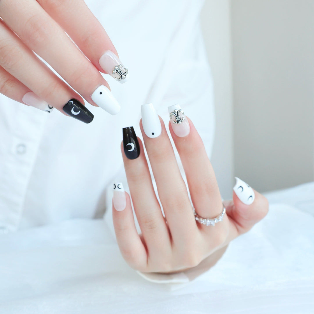 Artistic Press-On Nail Art Set with Elegant Moon and Star Designs