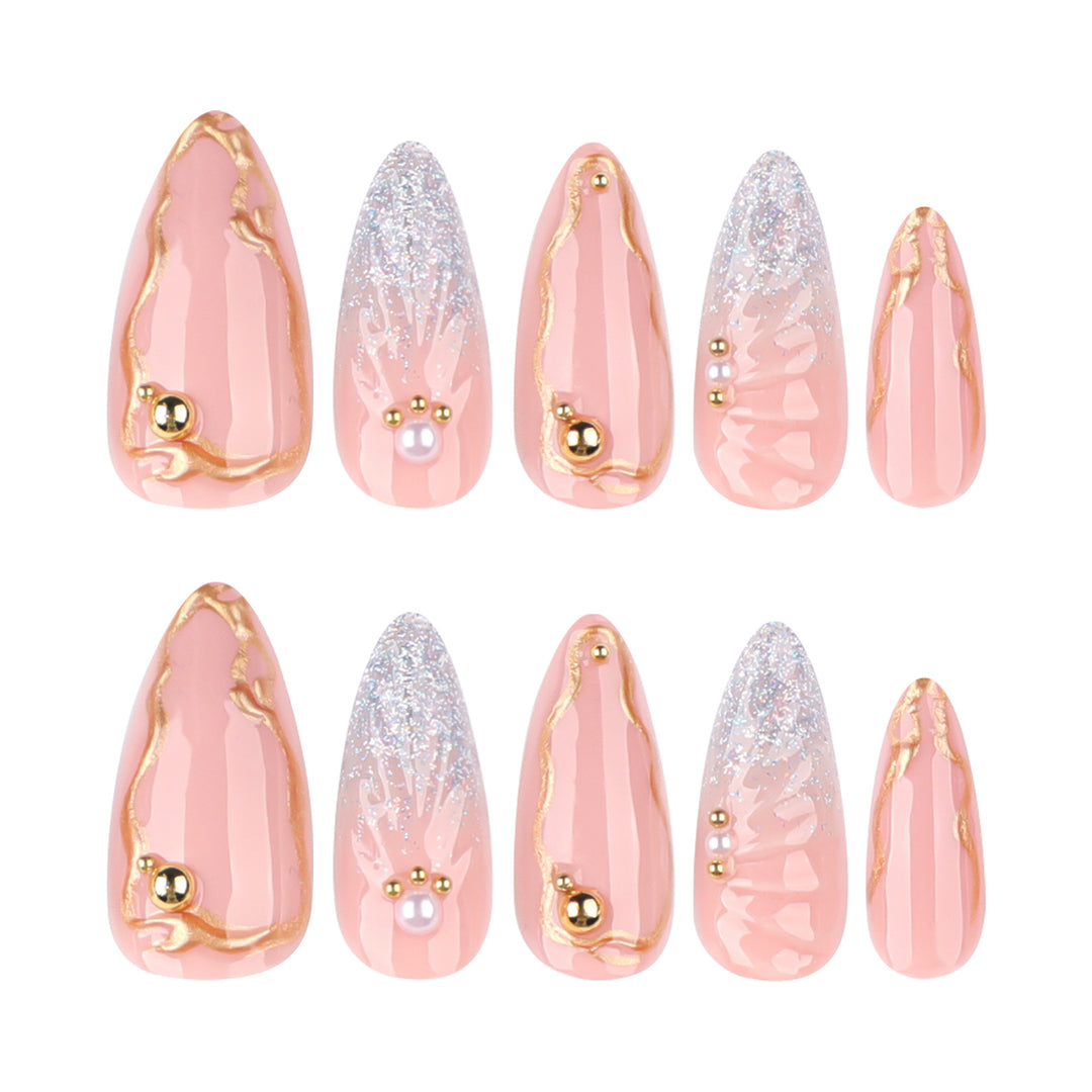 Artful stiletto nails with elegant gold embellishment design Kalsten