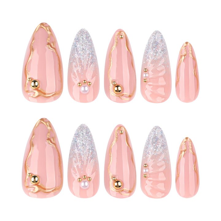 Artful stiletto nails with elegant gold embellishment design Kalsten
