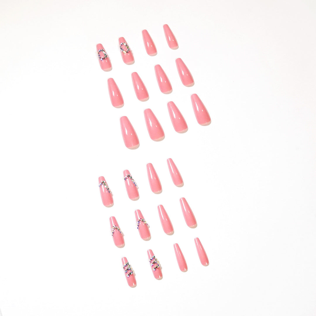 Artificial nail extensions with elegant rhinestone embellishments Kalsten