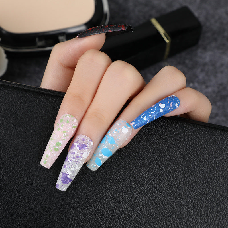 Artistic splatter design artificial nails Kalsten