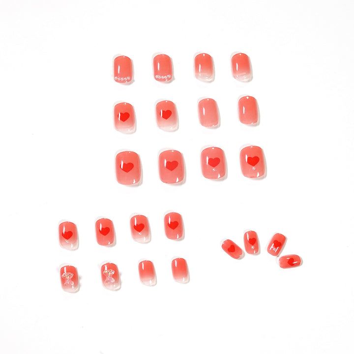 Artful nail art with radiant shine and heart motifs Kalsten