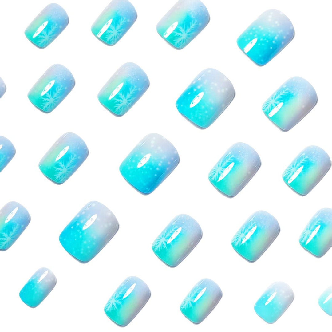 Wintry Artistic Nails with Shimmering Snowflake Design Kalsten
