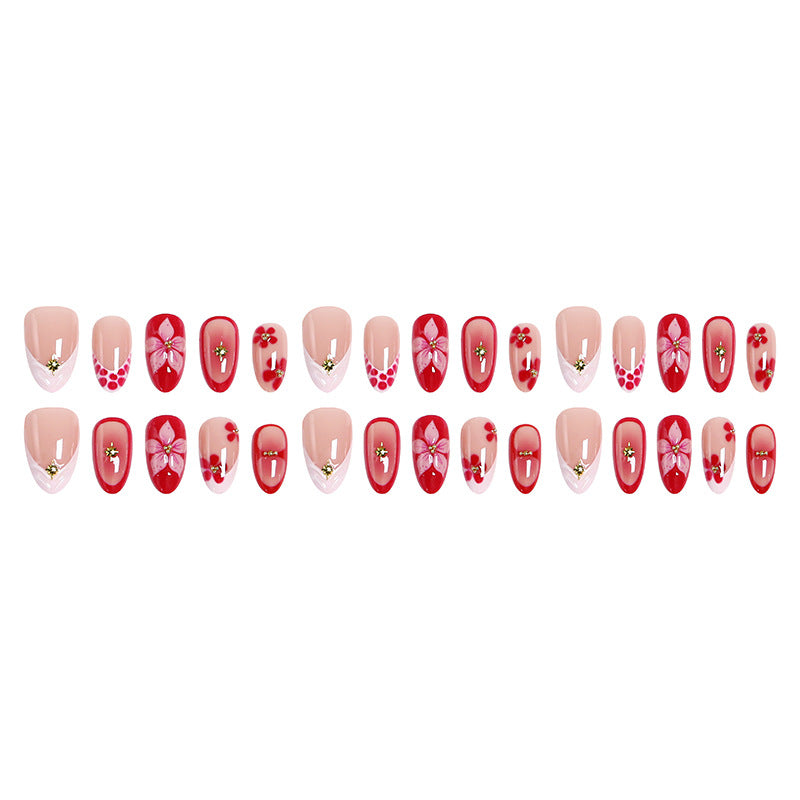 Artificial nails with floral design and glamorous accents Kalsten