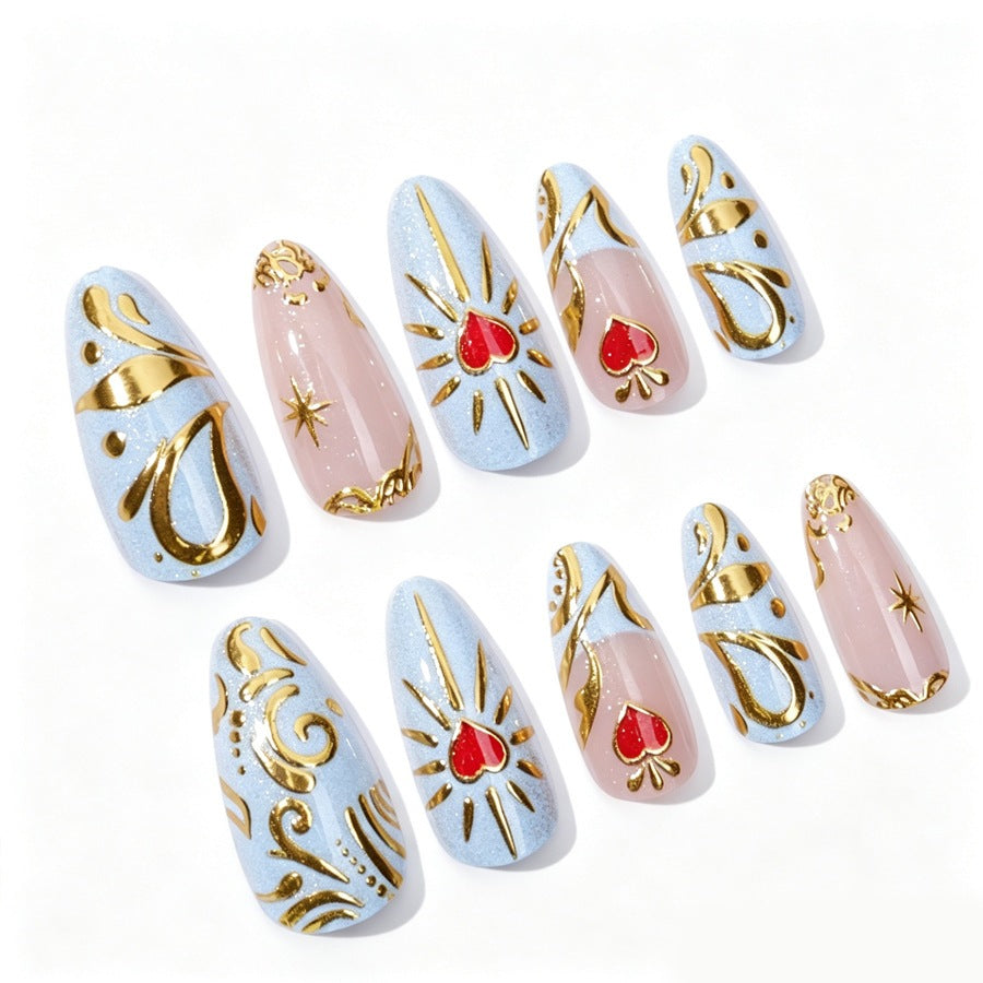Artificial nail set with filigree golden accents and romantic heart motifs Kalsten