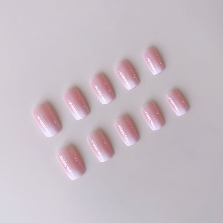Acrylic nail set with elegant ombre design and glitter accents Kalsten