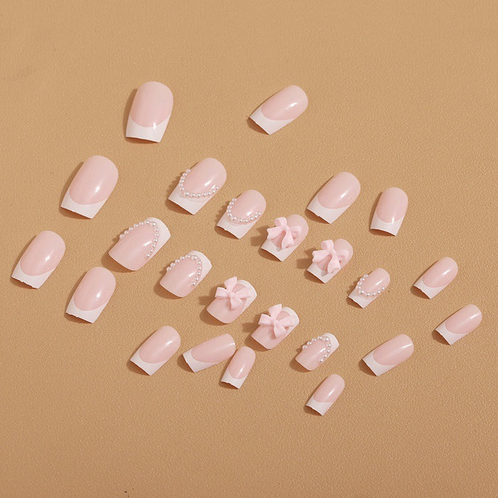 Artificial nail tips with elegant bows and pearl decorations Kalsten