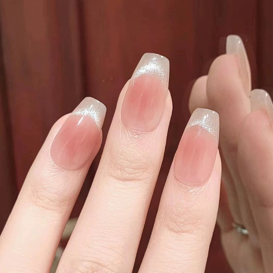 Nail set with elegant French design and sparkling accents Kalsten