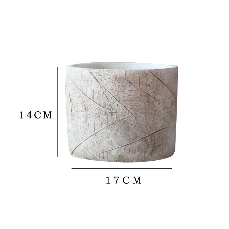 Decorative plant container made of handmade ceramic with leaf pattern Kalsten