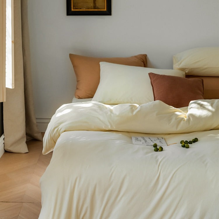 Minimalistic duvet cover set made of skin-friendly cotton blend with soft fiber filling