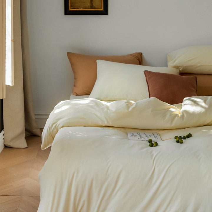 Minimalistic duvet cover set made of skin-friendly cotton blend with soft fiber filling