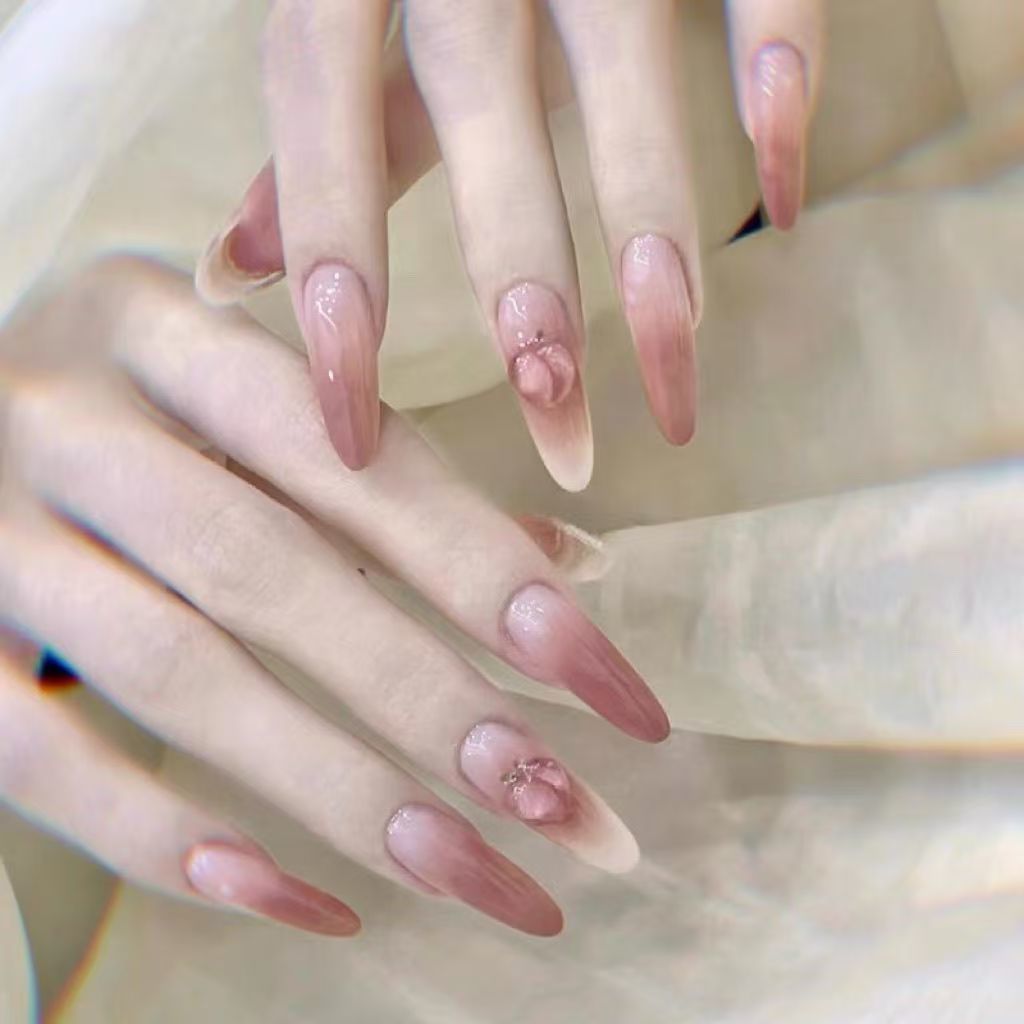 Artificial nails in elegant ombre design with fruit accents Kalsten