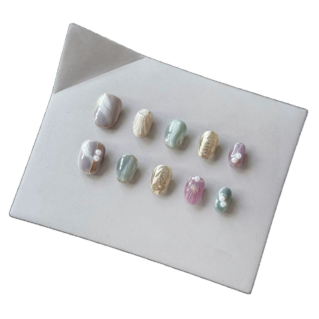Artistic Press-On Nail Set with Natural Marble Designs