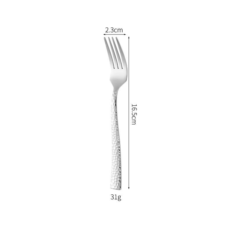 Elegant spoon with unique surface design Kalsten
