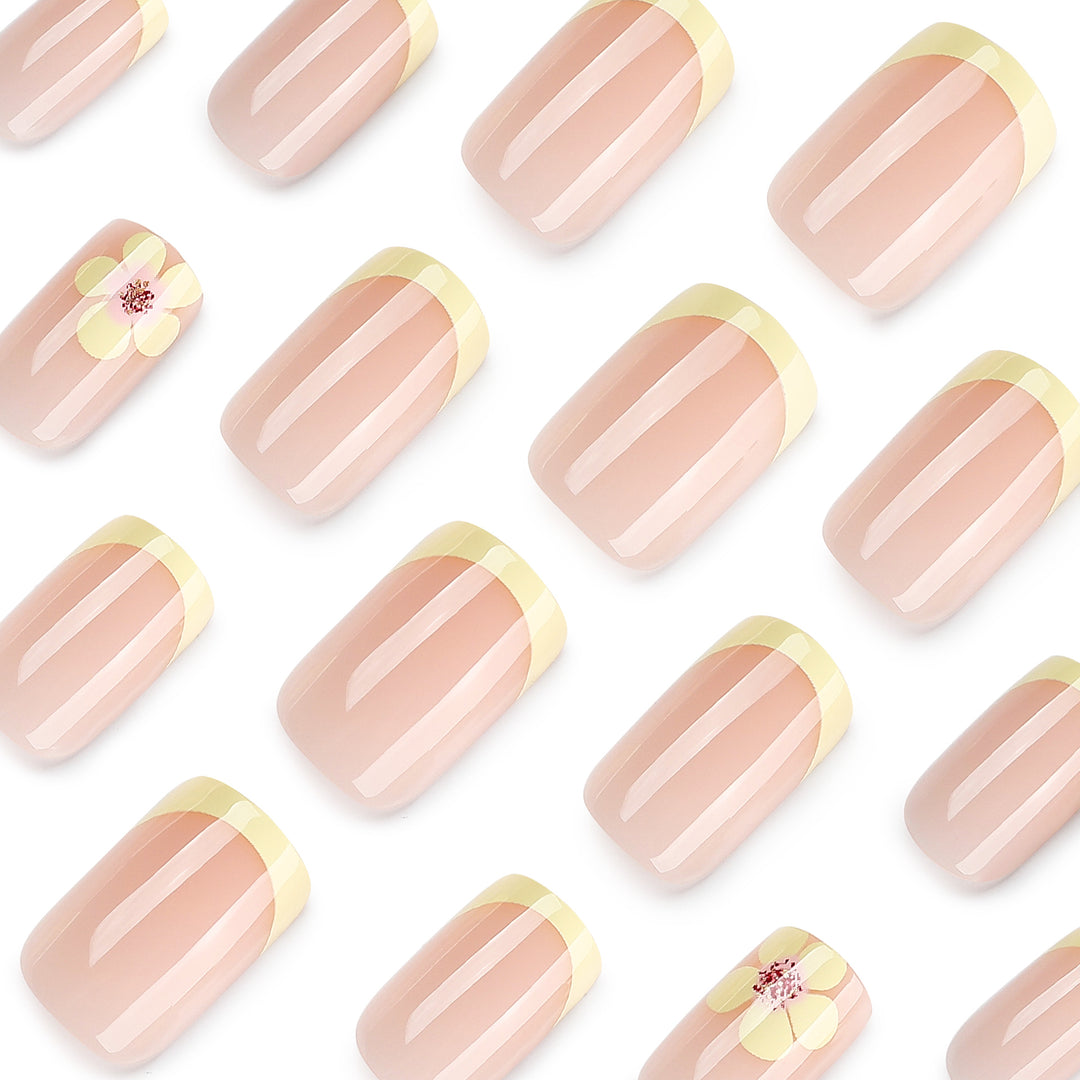 Artistic French-tip nails with floral decorations Kalsten