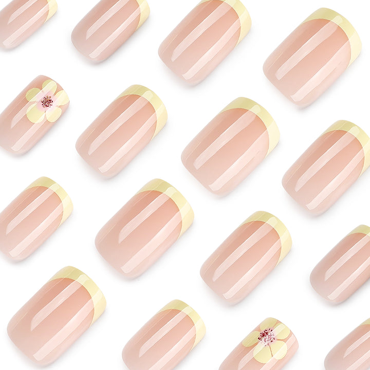 Artistic French-tip nails with floral decorations Kalsten