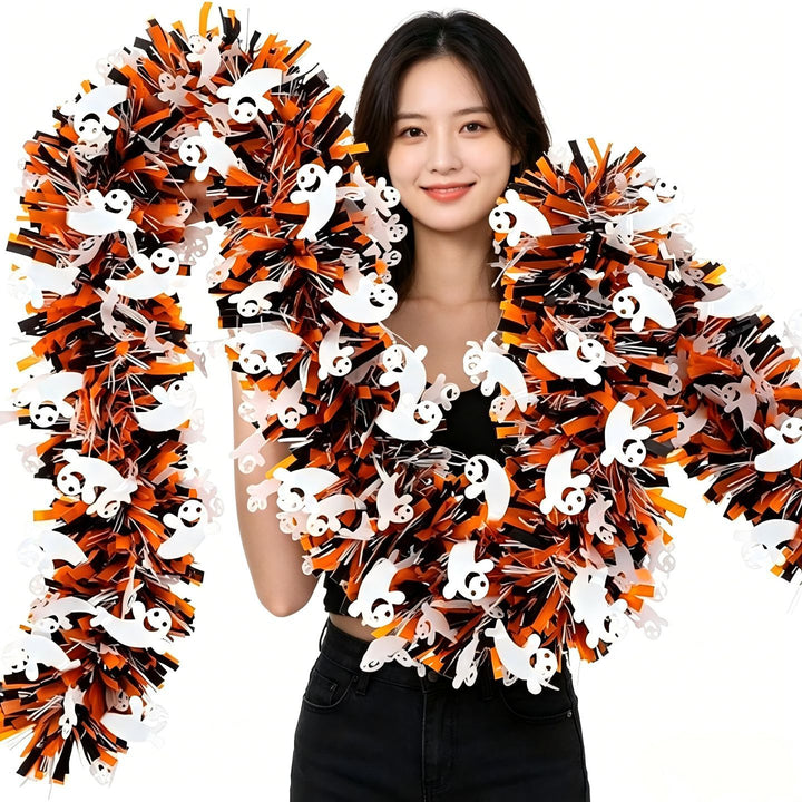 Shiny Halloween garland made of plastic with pumpkin confetti and dense fringes